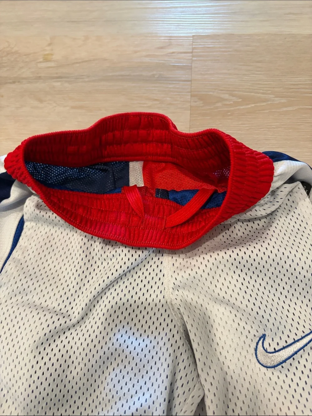 Nike White Mesh Shorts with Red Waistband and Blue Accents